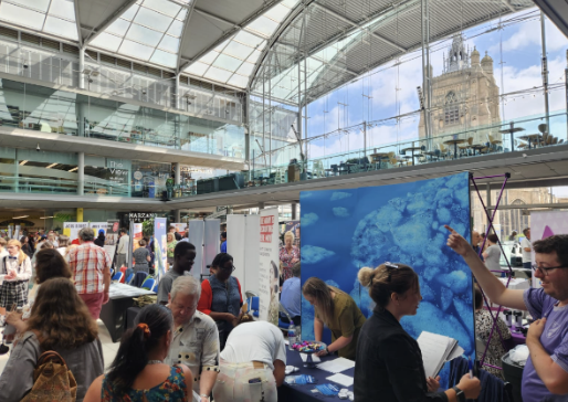 Recruitment fair stand and attendees