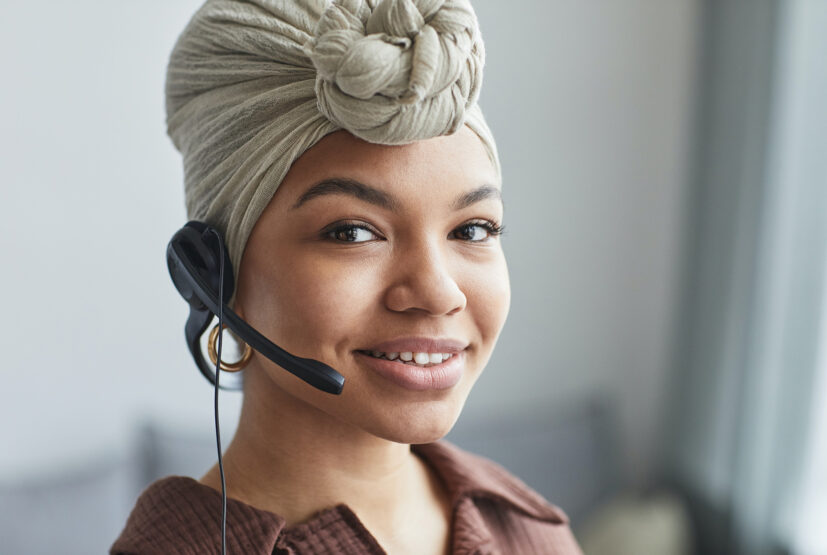 woman using telephone ear piece